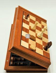 Chessboard with magnetic chessmen and checkers, in mahogany and maple, foldable